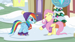 Size: 1280x720 | Tagged: safe, screencap, fluttershy, rainbow dash, pegasus, pony, g4, my little pony best gift ever, ^^, clothes, cute, dashabetes, earmuffs, eyes closed, female, fluttershy's purple sweater, hat, mare, open mouth, raised hoof, scarf, shyabetes, smiling, snow, sweater, sweatershy, winter outfit