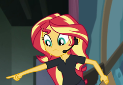 Size: 1409x983 | Tagged: safe, screencap, sunset shimmer, all the world's off stage, all the world's off stage: twilight sparkle, equestria girls, g4, my little pony equestria girls: better together, clipboard, cropped, director shimmer, female, headset, pointing, solo