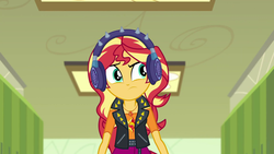 Size: 1920x1080 | Tagged: safe, screencap, sunset shimmer, equestria girls, equestria girls series, g4, overpowered (equestria girls), earmuffs, female, geode of empathy, hascon, headphones, magical geodes, solo