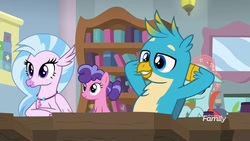 Size: 1920x1080 | Tagged: safe, screencap, berry blend, berry bliss, gallus, ocellus, silverstream, griffon, hippogriff, pony, a rockhoof and a hard place, g4, arm behind back, background pony, beak, female, friendship student, male, school of friendship, smiling