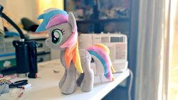 Size: 1024x577 | Tagged: safe, artist:nekokevin, oc, oc only, oc:rokuchan, earth pony, pony, female, irl, mare, photo, plushie, sewing machine, side view, smiling, solo