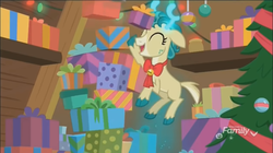 Size: 1354x758 | Tagged: safe, screencap, alice the reindeer, pony, g4, my little pony best gift ever, boxes, discovery family logo, female, flying, levitation, magic, oops, present, solo, telekinesis