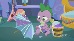 Size: 1350x752 | Tagged: safe, screencap, spike, dragon, g4, my little pony best gift ever, arts and crafts, ball, bucket, discovery family logo, glitter, globe, glue, guitar, jar, male, solo, umbrella, winged spike, wings
