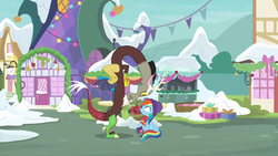 Size: 1280x720 | Tagged: safe, screencap, discord, rainbow dash, draconequus, pegasus, pony, g4, my little pony best gift ever, clothes, duo, female, hat, male, mare, ponyville, scarf, snow, winter, winter outfit