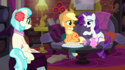 Size: 1440x810 | Tagged: safe, screencap, applejack, coco pommel, rarity, earth pony, pony, unicorn, g4, made in manehattan, apartment, applejack's hat, book, cello, coco's apartment, couch, cowboy hat, cup, fabric, female, food, hat, lamp, mare, musical instrument, teacup, teapot, trio