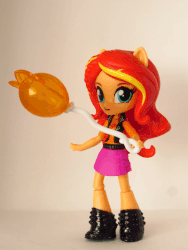 Size: 540x720 | Tagged: safe, artist:whatthehell!?, sunset shimmer, equestria girls, g4, my little pony equestria girls: better together, animated, boots, candy, clothes, doll, equestria girls minis, female, food, gif, globe, irl, lollipop, loop, photo, shoes, skirt, stop motion, theme park, toy