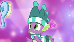 Size: 1280x720 | Tagged: safe, screencap, spike, dragon, g4, my little pony best gift ever, abstract background, clothes, gem, hairbrush, hat, purple background, scarf, simple background, striped scarf, winged spike, wings, winter outfit