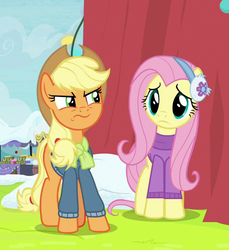 Size: 576x630 | Tagged: safe, screencap, applejack, fluttershy, earth pony, pegasus, pony, g4, my little pony best gift ever, applejack's hat, clothes, cowboy hat, cropped, earmuffs, female, fluttershy's purple sweater, hat, mare, sweater, sweatershy, trio, winter outfit