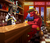 Size: 1500x1275 | Tagged: safe, artist:samum41, big macintosh, discord, draconequus, g4, the break up breakdown, alcohol, bar, bottle, bow, chair, clothes, cup, drink, glass, hat, lamp, male, mug, neon, pint glass, reflection, sad, scenery, sign, sitting, stallion, table, unshorn fetlocks, wine glass