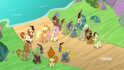Size: 1920x1080 | Tagged: safe, screencap, applejack, autumn afternoon, autumn blaze, cinder glow, fern flare, fluttershy, forest fall, maple brown, pumpkin smoke, rain shine, sparkling brook, spring glow, summer flare, winter flame, earth pony, kirin, pegasus, pony, sounds of silence, background kirin, cloven hooves, crowd, emotionless, female, male, mare, queen, smiling, stream of silence, water