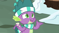 Size: 1280x720 | Tagged: safe, screencap, spike, dragon, g4, my little pony best gift ever, clothes, hat, male, scarf, smiling, solo, striped scarf, winged spike, wings, winter outfit