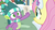 Size: 1280x720 | Tagged: safe, screencap, fluttershy, spike, dragon, pony, g4, my little pony best gift ever, clothes, female, male, mare, scarf, smiling, striped scarf, tail, winged spike, wings, winter outfit