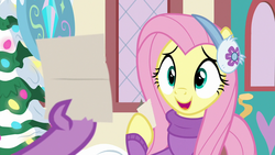 Size: 1280x720 | Tagged: safe, screencap, fluttershy, spike, dragon, pony, g4, my little pony best gift ever, claws, clothes, earmuffs, female, fluttershy's purple sweater, mare, offscreen character, solo focus, sweater, sweatershy, winged spike, wings, winter outfit
