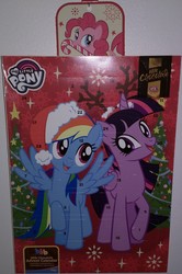 Size: 1835x2770 | Tagged: safe, pinkie pie, rainbow dash, twilight sparkle, alicorn, pony, g4, advent calendar, candy, candy cane, christmas, christmas lights, christmas tree, finland, food, hat, holiday, my little pony logo, santa hat, tree, twilight sparkle (alicorn)