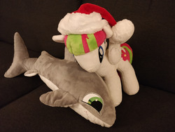 Size: 2000x1500 | Tagged: safe, artist:galekz, artist:skippymagrue, blossomforth, pony, shark, g4, christmas, cuddling, hat, holiday, irl, photo, plushie, santa hat, shark plushie
