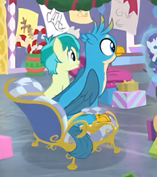 Size: 253x285 | Tagged: safe, screencap, gallus, sandbar, earth pony, griffon, pony, g4, hearth's warming shorts, my little pony best gift ever, mystery voice, chair, cropped, cute, gallabetes, male, rarity plushie, wings