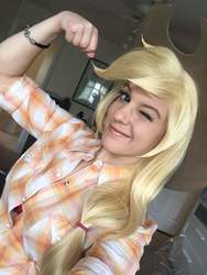 Size: 768x1024 | Tagged: safe, applejack, human, g4, applejack's hat, beautiful, blonde, clothes, cosplay, costume, cowboy hat, hat, irl, irl human, one eye closed, photo, smiling, wink