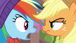 Size: 1280x720 | Tagged: safe, screencap, applejack, rainbow dash, g4, my little pony best gift ever, triple pony dare ya, angry, close-up, clothes, duo, female, freckles, glare, mare, rivalry, scarf, winter outfit