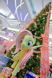 Size: 683x1024 | Tagged: safe, fluttershy, g4, christmas, christmas tree, creepy, holiday, irl, nightmare fuel, photo, statue, thailand, tree
