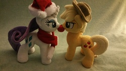 Size: 5312x2988 | Tagged: safe, artist:valmiiki, derpibooru exclusive, applejack, rarity, g4, alternate clothes, apple, christmas, clothes, cowboy hat, cute, duo, female, food, hat, holiday, irl, jackabetes, lesbian, nom, photo, plushie, raribetes, santa hat, scarf, ship:rarijack, shipping, that pony sure does love apples