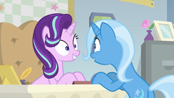 Size: 1280x720 | Tagged: safe, screencap, starlight glimmer, trixie, pony, unicorn, g4, road to friendship, butt, chair, desk, excited, flower, grin, inkwell, looking at each other, plot, quill, smiling, starlight's office, stars
