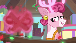 Size: 1280x720 | Tagged: safe, screencap, bori the reindeer, deer, reindeer, g4, my little pony best gift ever, bow, deer magic, female, levitation, magic, present, solo, telekinesis