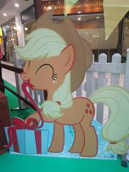 Size: 720x960 | Tagged: safe, photographer:陳重, applejack, pony, best gift ever, g4, cardboard cutout, female, present, singapore, solo
