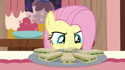 Size: 1280x720 | Tagged: safe, screencap, fluttershy, pegasus, pony, discordant harmony, g4, cute, female, food, mare, sandwich, shyabetes, smiling, solo, soon