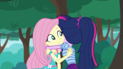 Size: 1280x720 | Tagged: safe, screencap, fluttershy, sci-twi, twilight sparkle, equestria girls, g4, my little pony equestria girls: better together, text support, text support: fluttershy, female, geode of fauna, hug, magical geodes