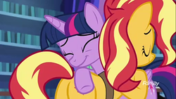 Size: 854x480 | Tagged: safe, screencap, sunset shimmer, twilight sparkle, alicorn, equestria girls, equestria girls specials, g4, my little pony equestria girls: better together, my little pony equestria girls: forgotten friendship, butt, discovery family logo, hug, plot, twilight sparkle (alicorn)