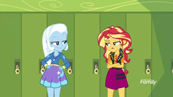 Size: 1280x720 | Tagged: safe, screencap, sunset shimmer, trixie, equestria girls, equestria girls specials, g4, my little pony equestria girls: better together, my little pony equestria girls: forgotten friendship, crossed arms, discovery family logo, hand on hip, lockers