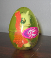 Size: 302x346 | Tagged: safe, baby glory, alicorn, pony, bootleg, brush, egg, female, filly, irl, photo, solo, toy