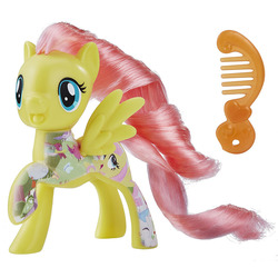 Size: 1000x1000 | Tagged: safe, fluttershy, pegasus, pony, g4, brushable, comb, female, irl, mare, photo, solo, toy