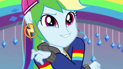 Size: 1912x1072 | Tagged: safe, screencap, rainbow dash, equestria girls, equestria girls specials, g4, my little pony equestria girls: dance magic, my little pony equestria girls: mirror magic, backwards ballcap, baseball cap, cap, clothes, ear piercing, female, hat, hip hop, jacket, music video, outfit, piercing, ponied up, rapper, rapper dash, smiling, solo, stage
