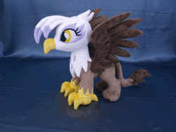 Size: 800x600 | Tagged: safe, artist:adamar44, gilda, griffon, g4, animated, irl, majestic, perfect loop, photo, plushie, rotating, solo, spread wings, stop motion, wings