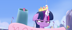 Size: 1920x804 | Tagged: safe, screencap, pinkie pie, twilight sparkle, alicorn, earth pony, pony, g4, my little pony: the movie, angry, cake, candle, crown, duo, floppy ears, food, frosting, giant cake, jewelry, party cannon, regalia, smoke, solo focus, twilight sparkle (alicorn), twilight sparkle is not amused, unamused