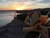 Size: 4032x3024 | Tagged: safe, artist:epicrainbowcrafts, sunset shimmer, pony, unicorn, g4, drink, glass, irl, ocean, photo, plushie, pun, sunset, sunshine shimmer, visual pun