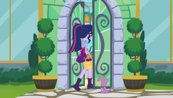 Size: 2208x1242 | Tagged: safe, screencap, sci-twi, spike, spike the regular dog, twilight sparkle, dog, equestria girls, equestria girls series, g4, my little shop of horrors, boots, celestia's house, clothes, gloves, plants, raised leg, rear view, shoes, watering can