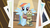 Size: 1280x720 | Tagged: safe, screencap, rainbow dash, bird, owl, pegasus, pony, g4, may the best pet win, book, clothes, crossed hooves, duo, leaning, photo, pose, side by side, smiling, sweater