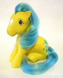 Size: 460x568 | Tagged: safe, photographer:sosilver, bubbles (g1), earth pony, pony, g1, coat markings, facial markings, female, france, irl, mare, photo, sitting, solo, star (coat marking), toy