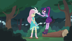 Size: 2208x1242 | Tagged: safe, screencap, angel bunny, fluttershy, sci-twi, twilight sparkle, butterfly, equestria girls, equestria girls series, g4, stressed in show, stressed in show: fluttershy, boots, bowtie, clothes, eyes closed, glasses, gritted teeth, jumping, log, mud, muddy, ponytail, shoes, skirt, smiling, stressed