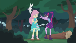 Size: 2208x1242 | Tagged: safe, screencap, angel bunny, fluttershy, sci-twi, twilight sparkle, butterfly, equestria girls, g4, my little pony equestria girls: better together, stressed in show, stressed in show: fluttershy, boots, eyes closed, glasses, gritted teeth, jumping, lidded eyes, log, mud, muddy, open mouth, ponytail, shoes