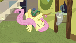 Size: 1280x720 | Tagged: safe, screencap, fluttershy, pegasus, pony, discordant harmony, g4, my little pony: friendship is magic, butterfly net, butterfly sandwich, cute, female, happy, mare, shyabetes, solo