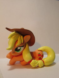 Size: 1024x1365 | Tagged: safe, artist:earthenpony, applejack, earth pony, pony, g4, craft, irl, photo, prone, sculpture, solo, traditional art
