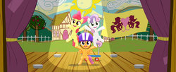 Size: 780x319 | Tagged: safe, screencap, apple bloom, scootaloo, sweetie belle, earth pony, pegasus, pony, unicorn, flight to the finish, g4, cutie mark crusaders, female, filly, flag, pony pyramid, ponyville flag, scooter, spotlight, stage, sun, trio