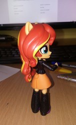 Size: 768x1262 | Tagged: safe, artist:artofmagicpoland, derpibooru exclusive, sunset shimmer, equestria girls, g4, boots, clothes, doll, equestria girls minis, female, irl, jacket, leather jacket, looking at you, phone, photo, pinup, sexy, shoes, skirt, sultry pose, toy