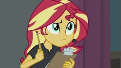 Size: 1280x720 | Tagged: safe, screencap, sunset shimmer, all the world's off stage, equestria girls, equestria girls series, g4, choose your own ending (season 1), clipboard, director shimmer, female, pencil, serious, solo, theater
