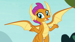 Size: 1280x720 | Tagged: safe, screencap, smolder, dragon, g4, school daze, cute, dragoness, female, flying, looking at you, shrug, smolderbetes, solo, spread arms, spread wings, wings, ¯\(ツ)/¯