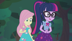 Size: 2208x1242 | Tagged: safe, screencap, fluttershy, sci-twi, twilight sparkle, butterfly, equestria girls, g4, my little pony equestria girls: better together, stressed in show, stressed in show: fluttershy, bowtie, cute, female, geode of fauna, geode of telekinesis, glasses, happy, looking down, magical geodes, open mouth, ponytail, twiabetes