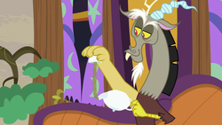 Size: 1280x720 | Tagged: safe, screencap, discord, draconequus, discordant harmony, g4, discord being discord, male, solo, teapot, upside down